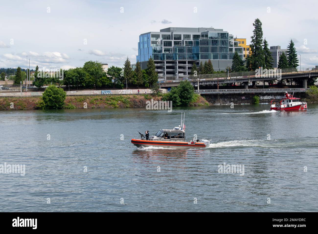 A u s coast guard security boat and portland fire and rescue fire boat