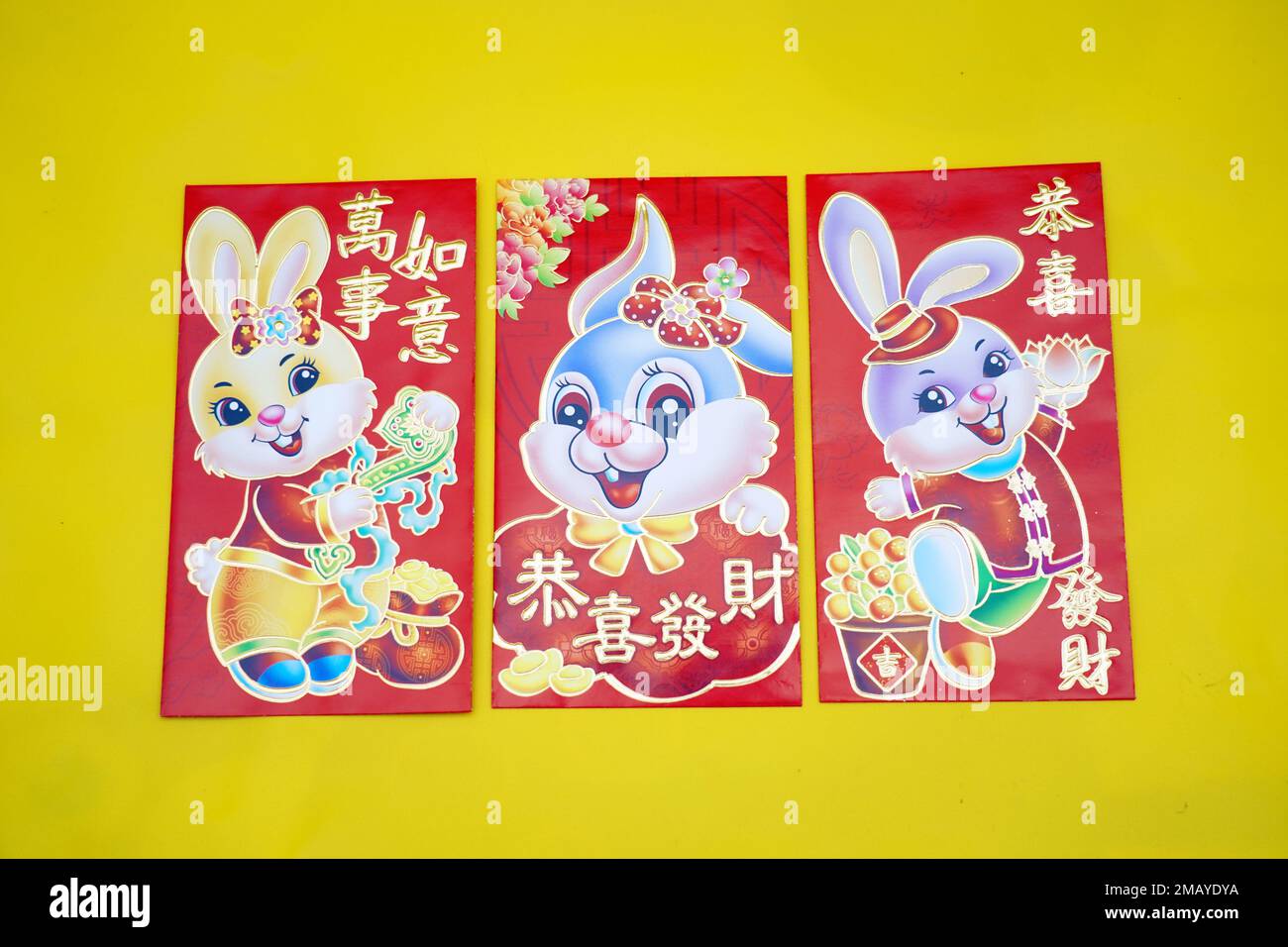theme-red-envelopes-with-rabbit-chinese-blessing-words-on-yellow