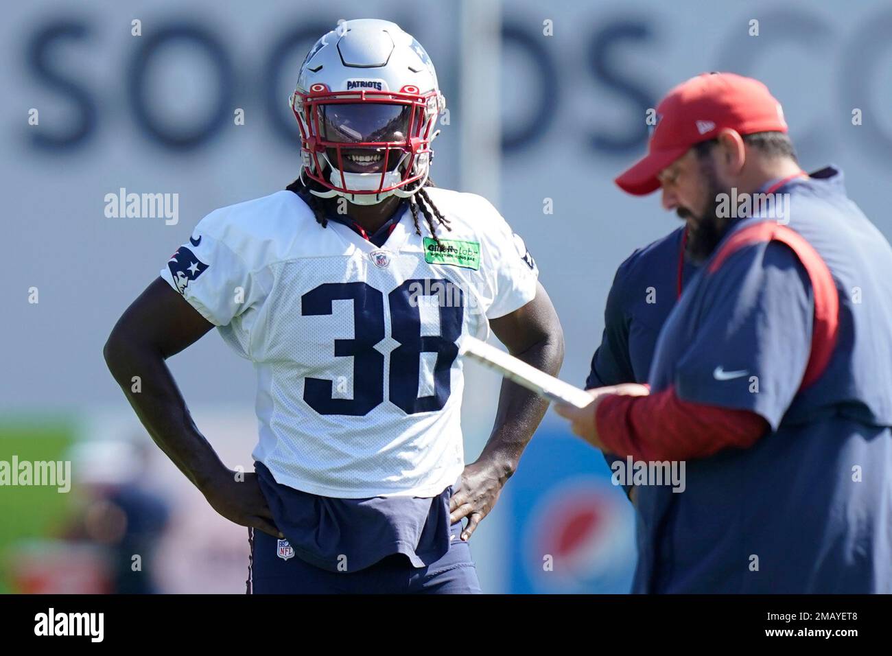 New England Patriots running back Rhamondre Stevenson (38) stands near
