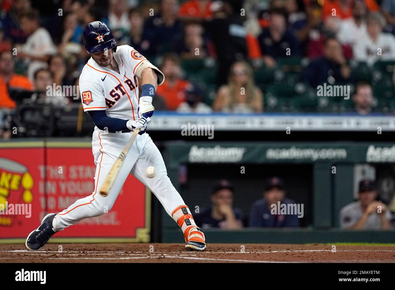 Houston Astros' Alex Bregman hits a sacrifice fly to score Jeremy Pena