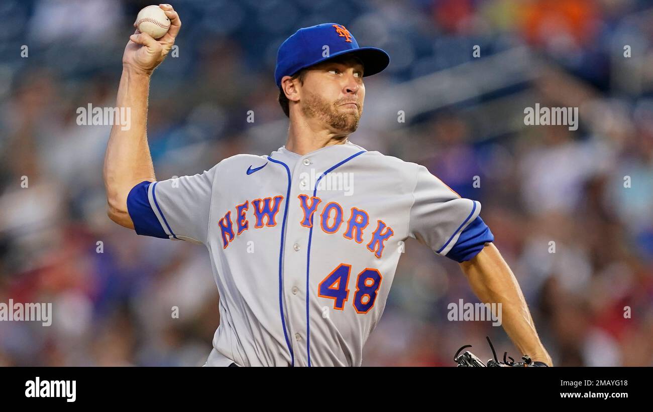 New York Mets starting pitcher Jacob deGrom throws during a baseball
