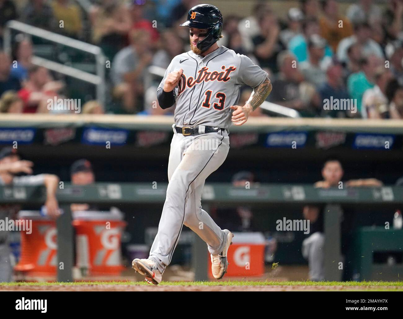 Detroit Tigers' Eric Haase scores on a single by Akil Baddoo during the