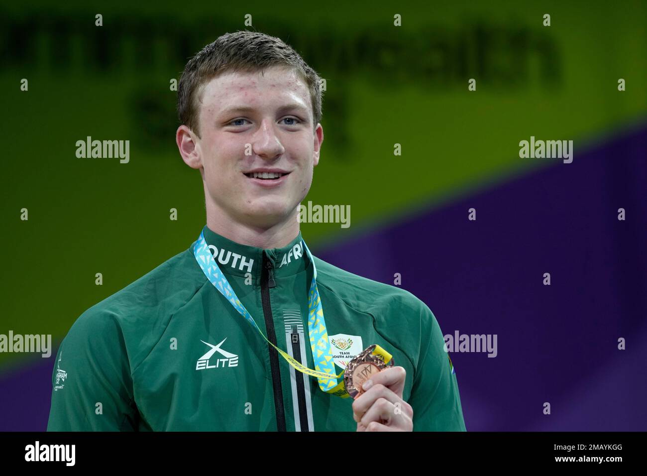 Bronze medalist Pieter Coetze of South Africa celebrates during a medal