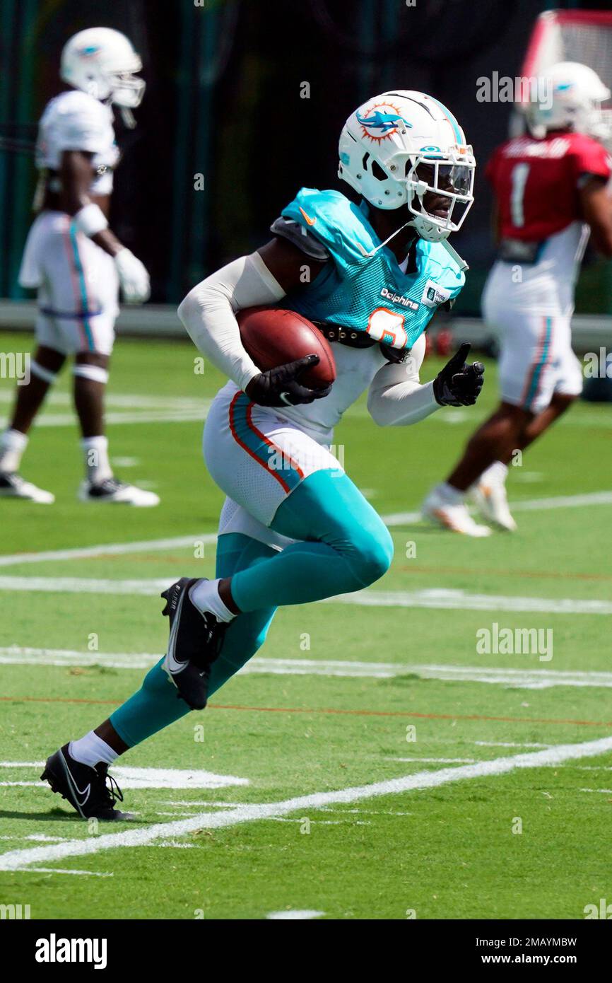 Miami Dolphins cornerback Noah Igbinoghene (9) does drills during