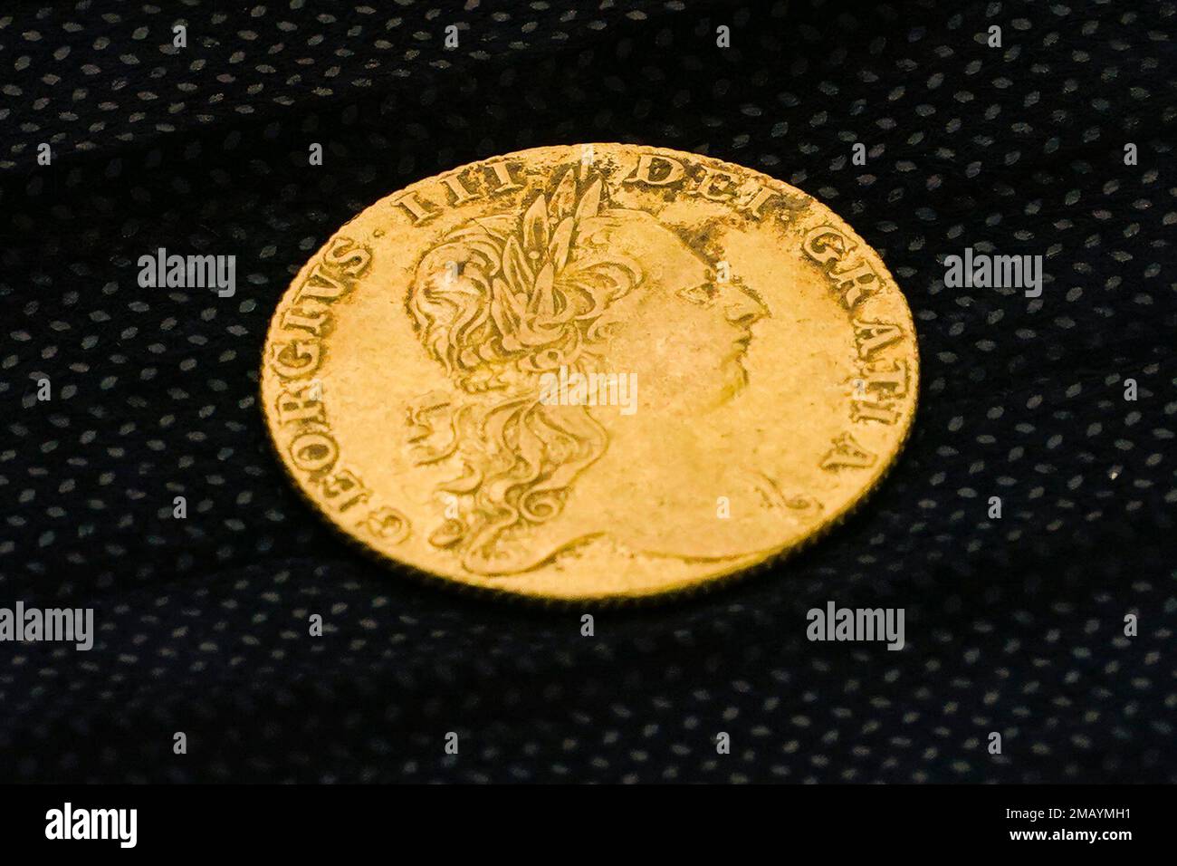 Shown is a King III gold guinea, discovered in an excavation site at the Red Bank