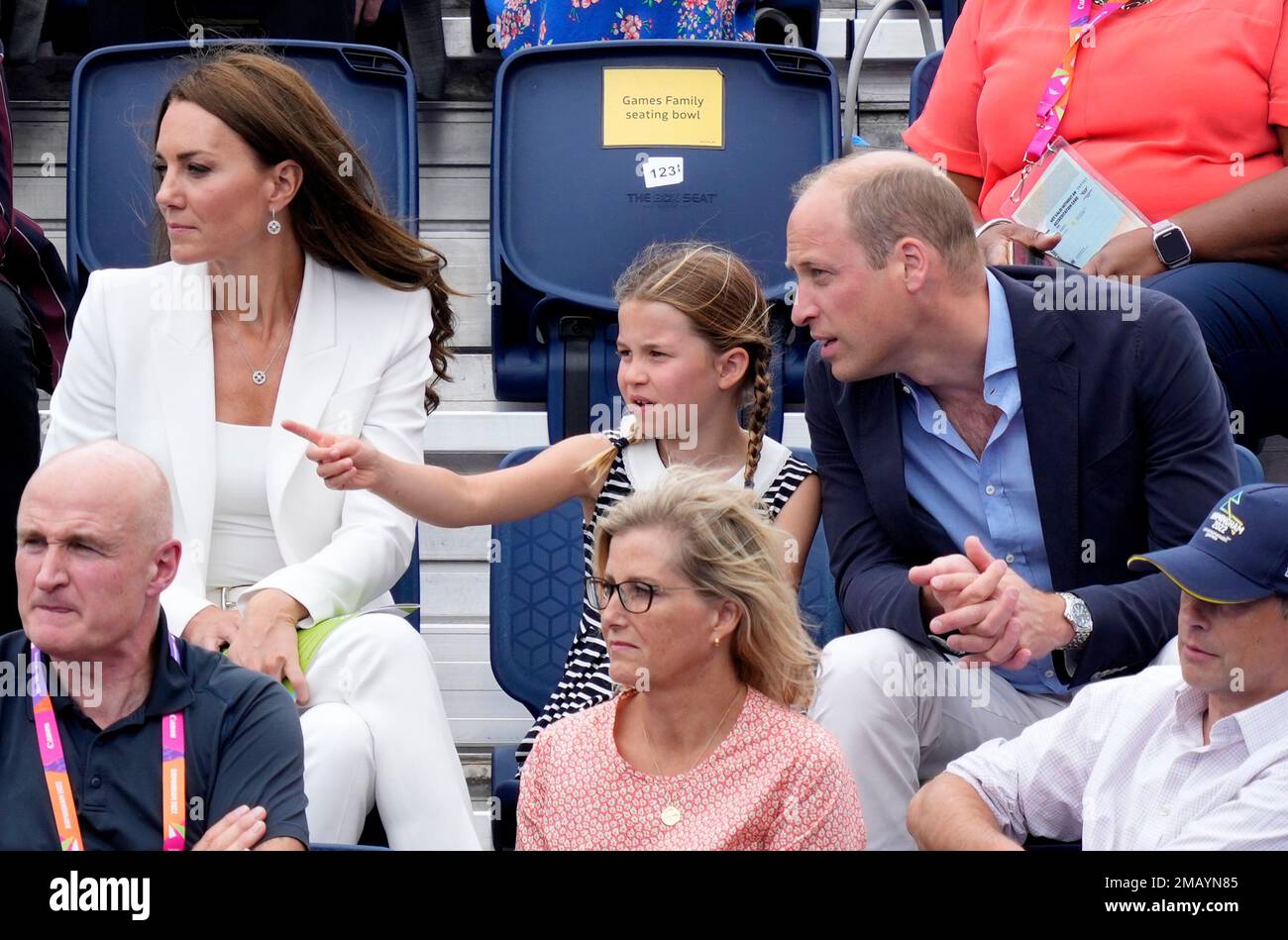 Princess Charlotte gestures with Britain's Prince William and Kate ...