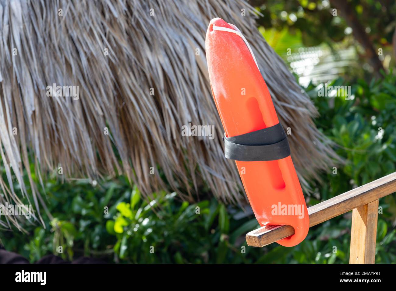 Swimming area safety equipment, red lifeguard rescue can Stock Photo