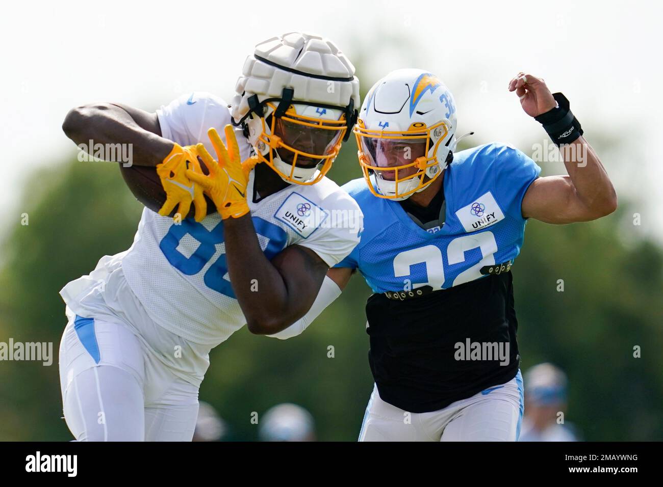 Los Angeles Chargers tight end Tre' McKitty (88) and safety Alohi