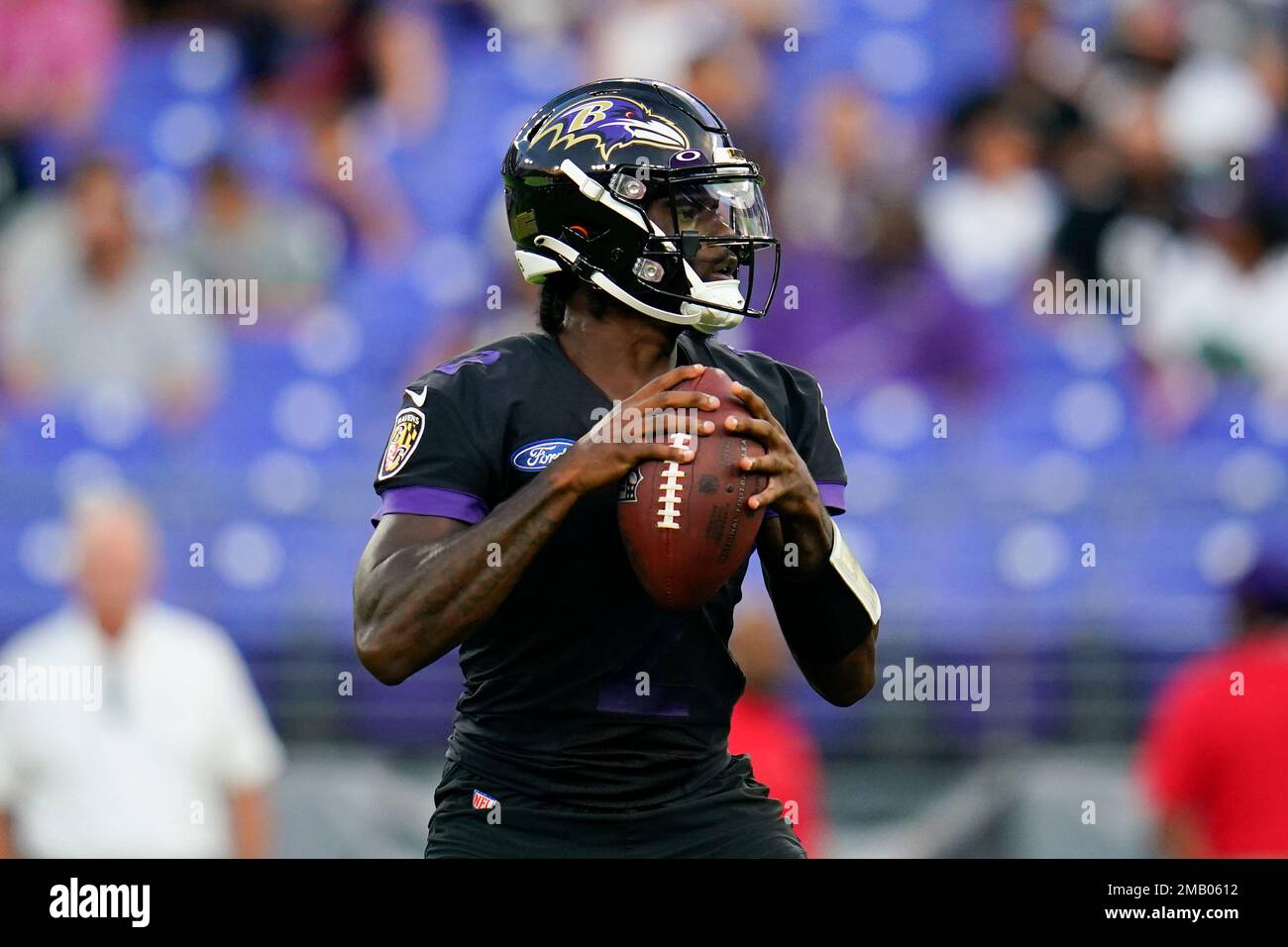 Baltimore Ravens quarterback Tyler Huntley works out during the team's