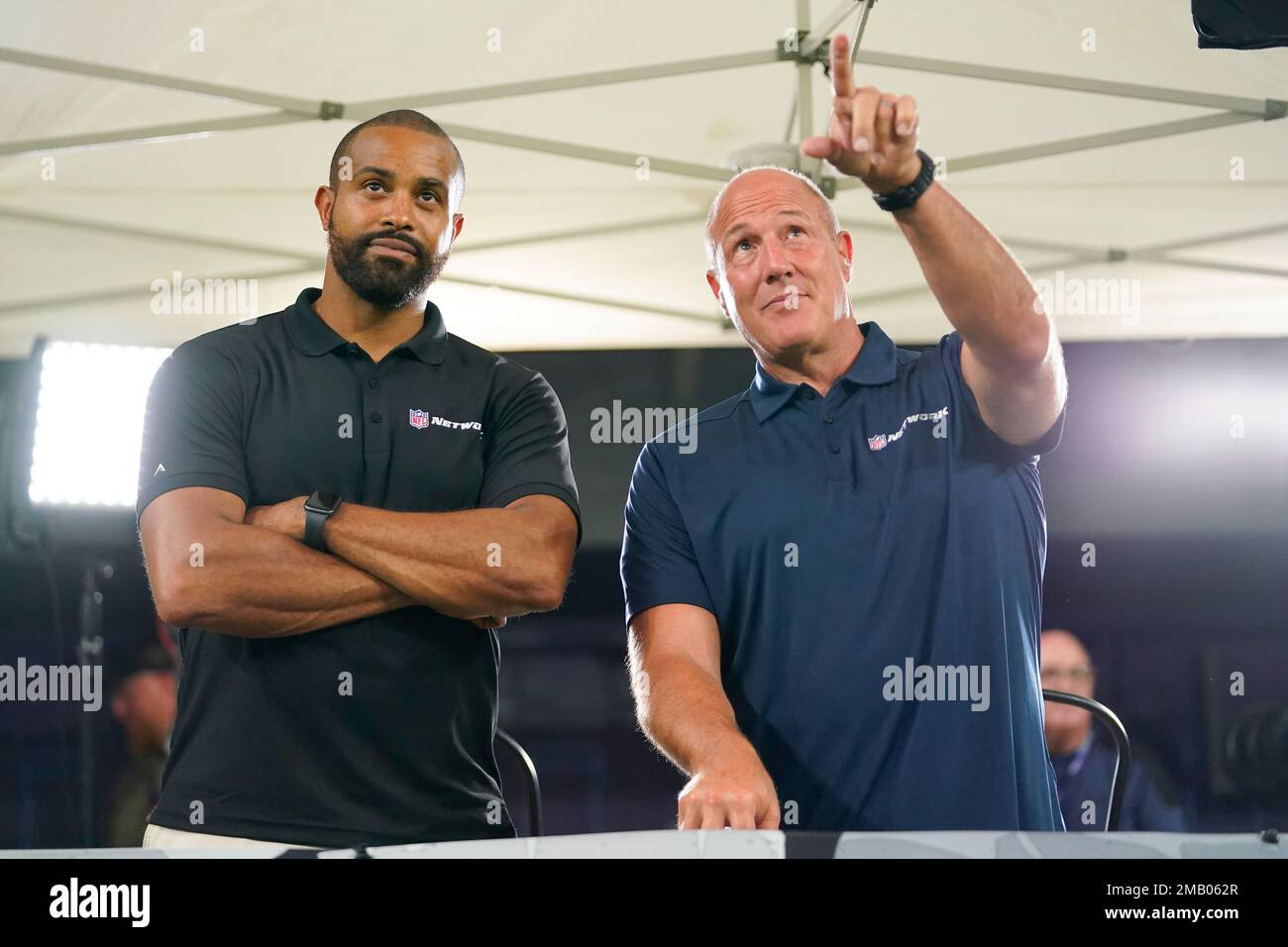 NFL Network broadcast reporters Patrick Claybon, left, and Scott Pioli