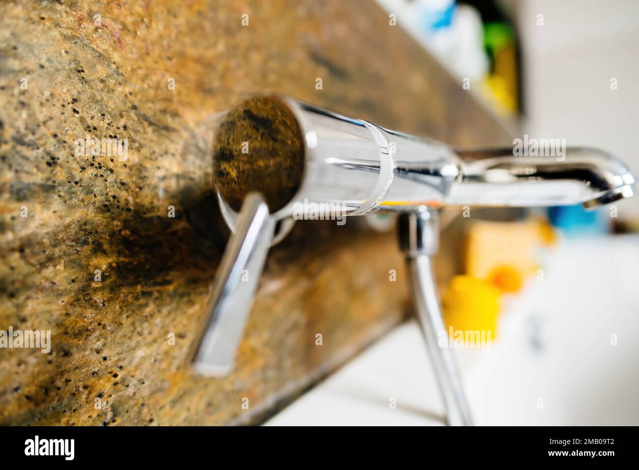 Lateral view of modern luxury chrome bathroom bathtub faucet with line