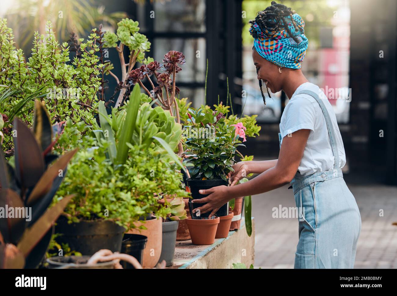African woman working in garden hi-res stock photography and images - Alamy
