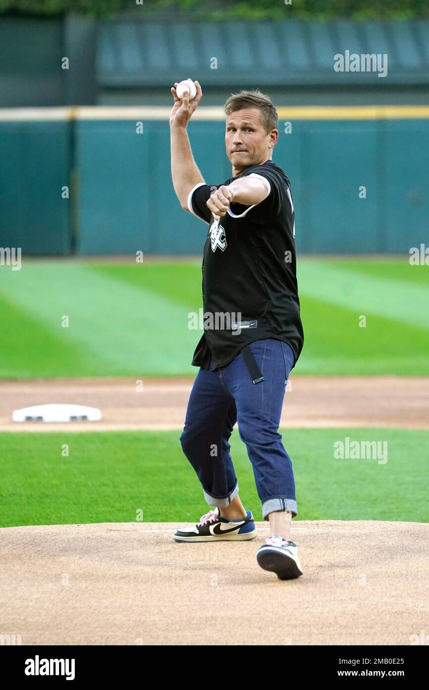 American DJ Kaskade, throws out a ceremonial first pitch before a