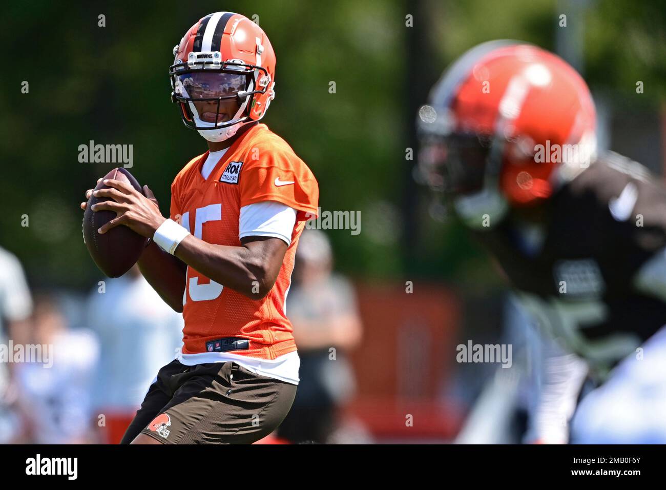 Cleveland Browns quarterback Joshua Dobbs (15) looks to hand off the ball  during an NFL pre-season football game against the Cleveland Browns,  Friday, Aug. 11, 2023, in Cleveland. (AP Photo/Kirk Irwin Stock