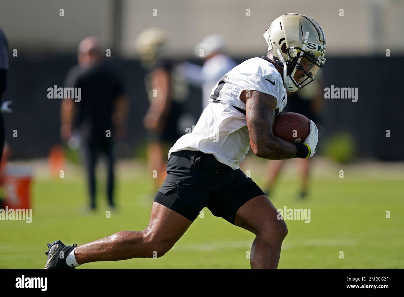 New Orleans Saints running back Abram Smith runs a route during training camp at their NFL