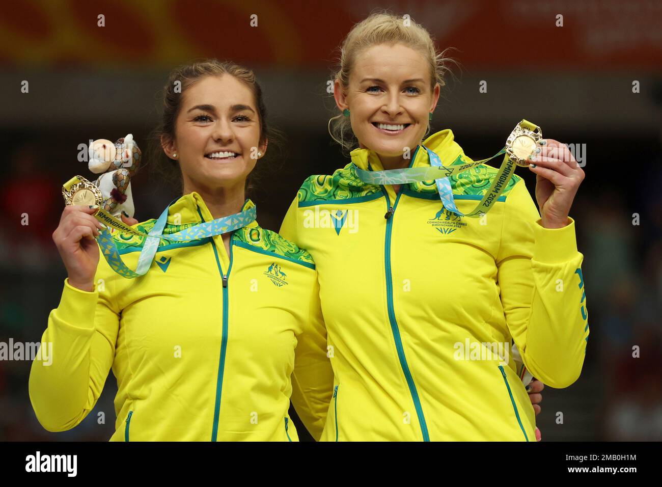 Australia's Jessica Gallagher and pilot Caitlin Ward celebrate with gold medals during a medal