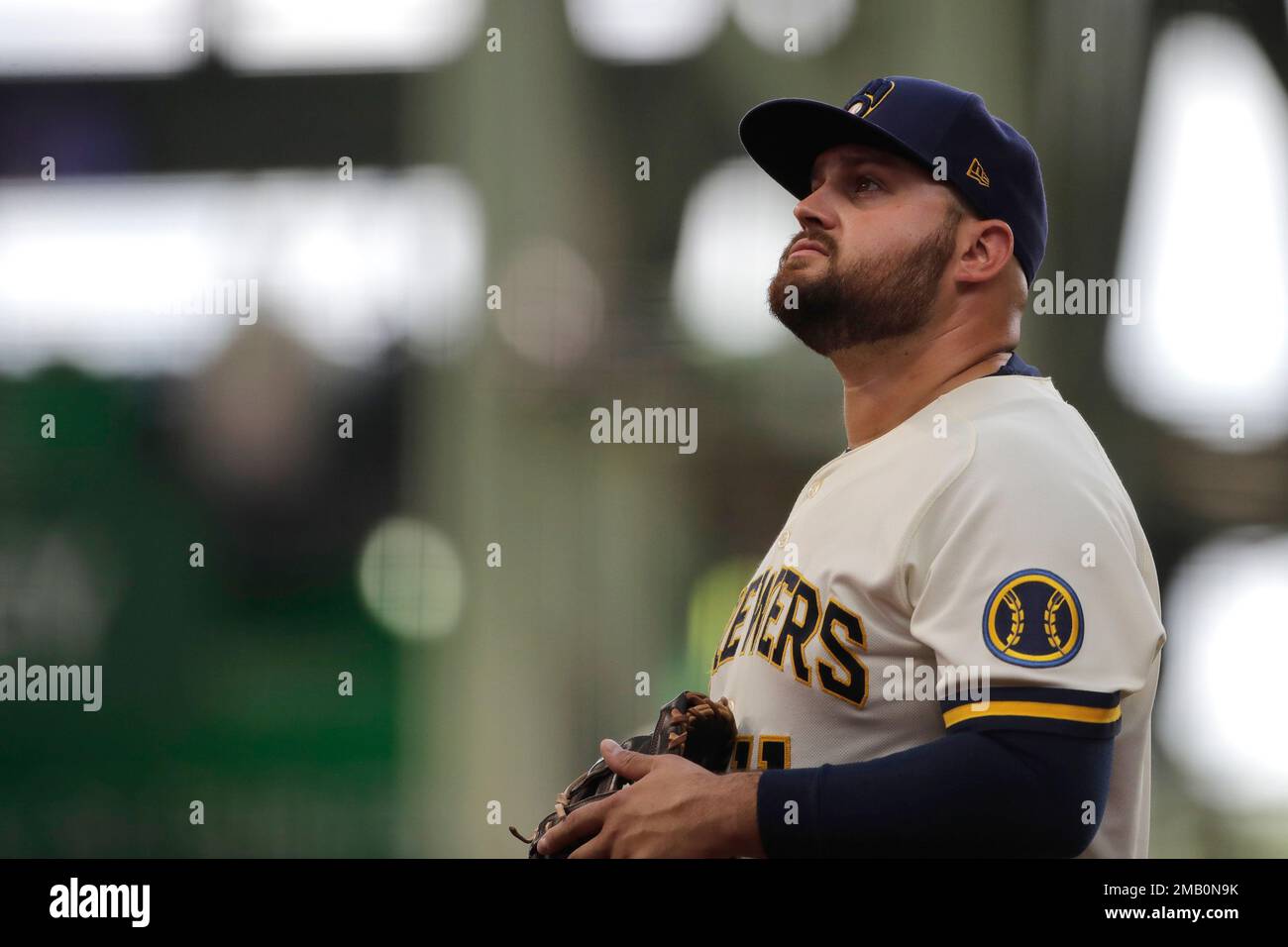 Milwaukee Brewers' Rowdy Tellez looks up at the roof opening at American  Family Field during the fourth inning of a baseball game against the  Minnesota Twins Wednesday, July 27, 2022, in Milwaukee. (