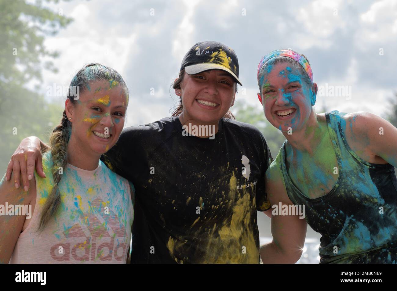 Participants of the Pride 5K Color Walk/Run pose for a photo at the ...