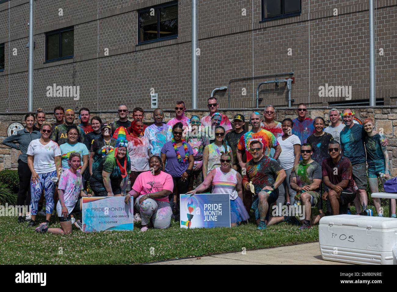 Participants apart of the Pride 5K Color Walk/Run pose for a group ...
