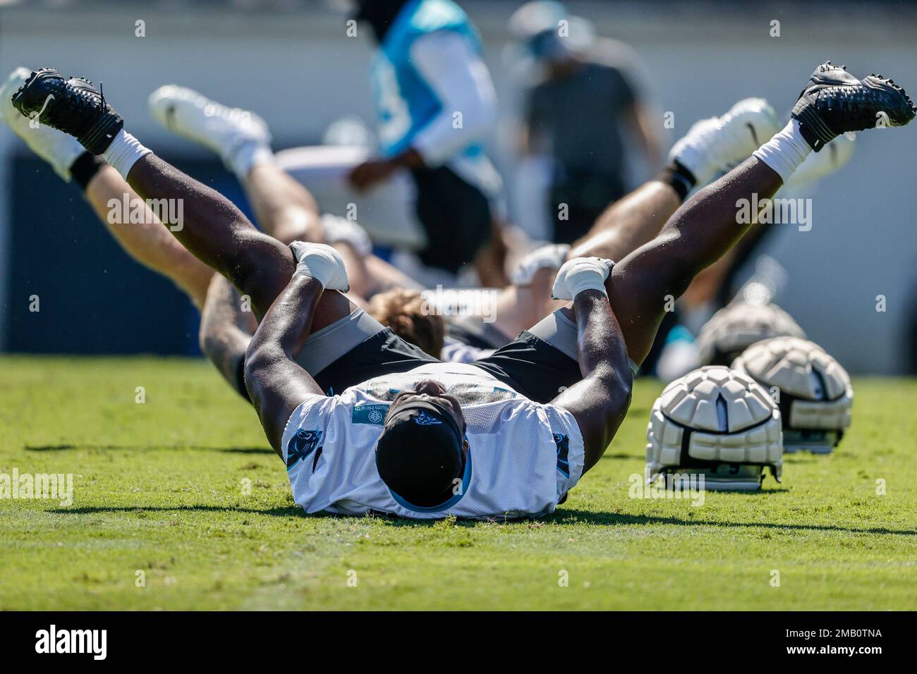 Carolina Panthers Tackle Ikem Ekwonu Stretches At The NFL Football Team ...