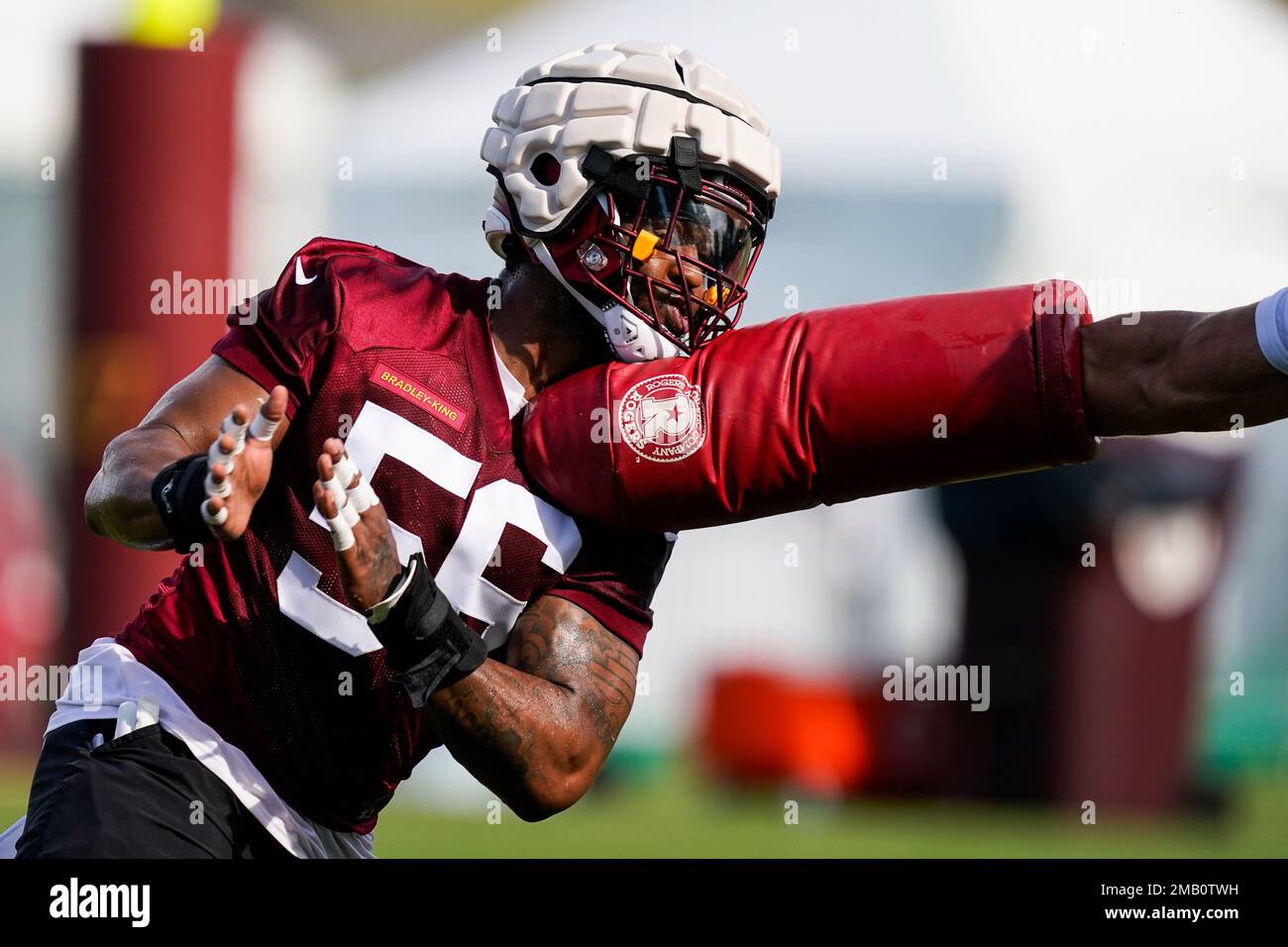 Washington Commanders defensive end Will Bradley-King (56) runs a drill  during an NFL football practice at FedEx Field, Saturday, Aug. 6, 2022, in  Landover, Md. (AP Photo/Alex Brandon Stock Photo - Alamy