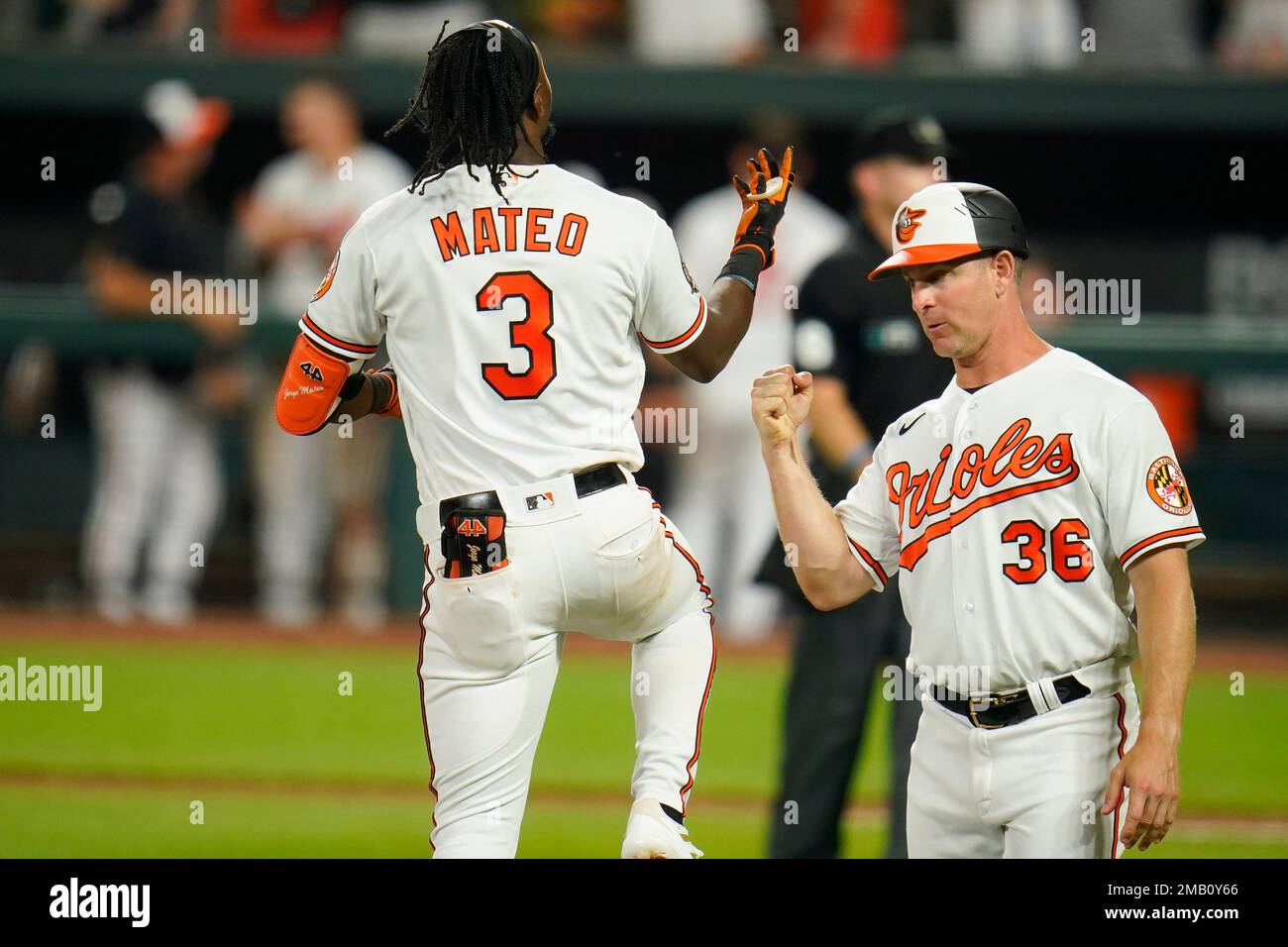 Baltimore Orioles' Jorge Mateo, left, reacts while running by