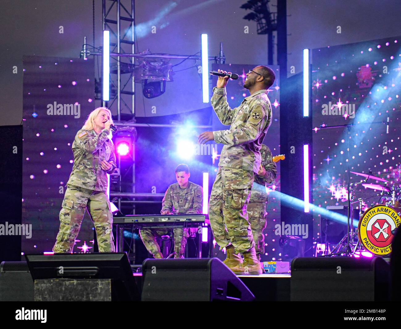 The Eighth Army Band performs at a K-Pop concert held on Balboni Field at Camp Humphreys, June 9, 2022. KATUSA & U.S. Soldier Friendship week is held to promote friendship and cross-cultural understanding between KATUSA and U.S. Soldiers. Additional performers included Young K, Layone, 3YE, Jamie, and Alice. Stock Photo