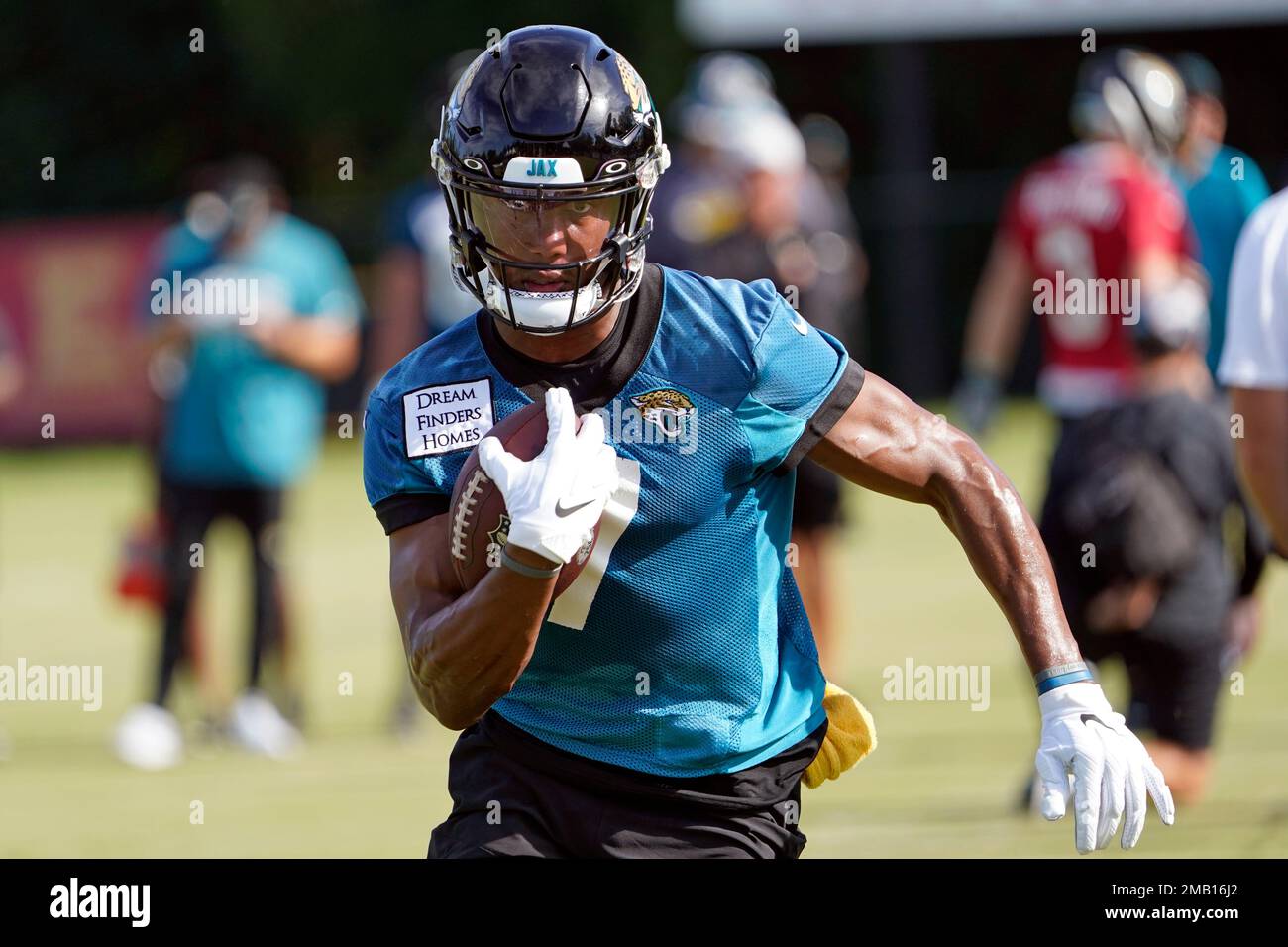 Jacksonville Jaguars wide receiver Zay Jones (7) runs after catching a