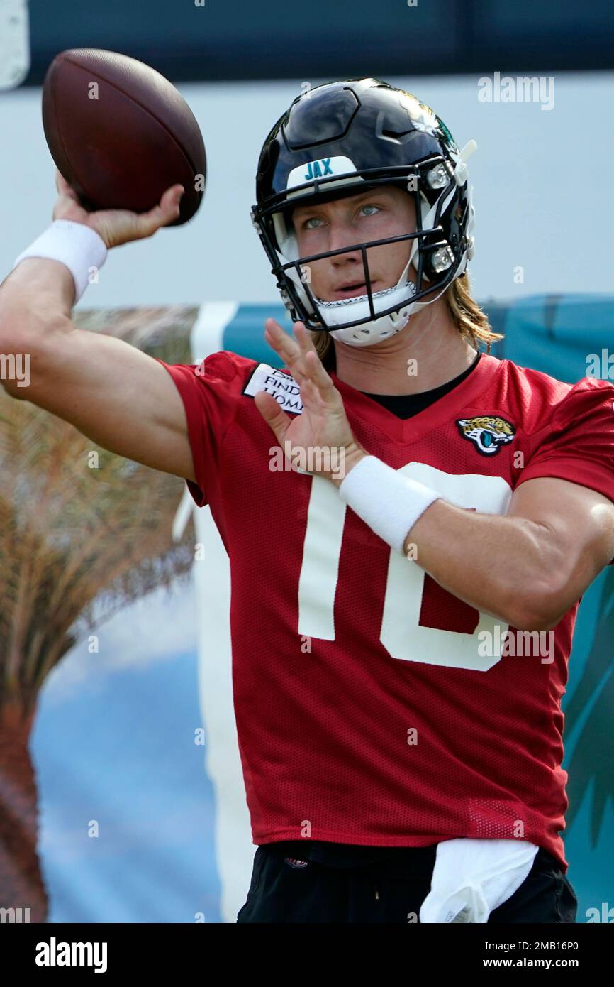 Jacksonville Jaguars quarterback Trevor Lawrence (16) throws a pass