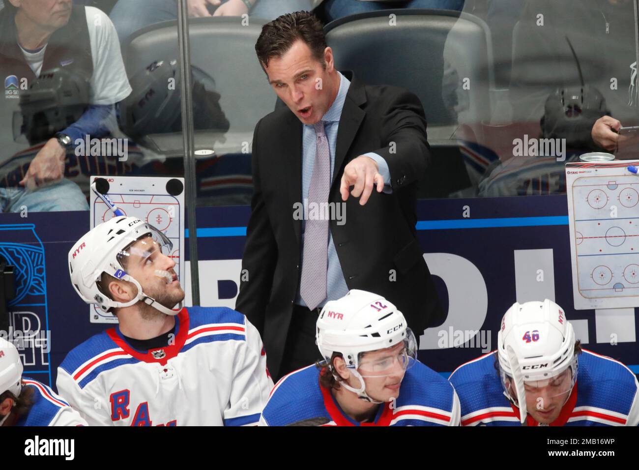 FILE New York Rangers head coach David Quinn talks to players in the