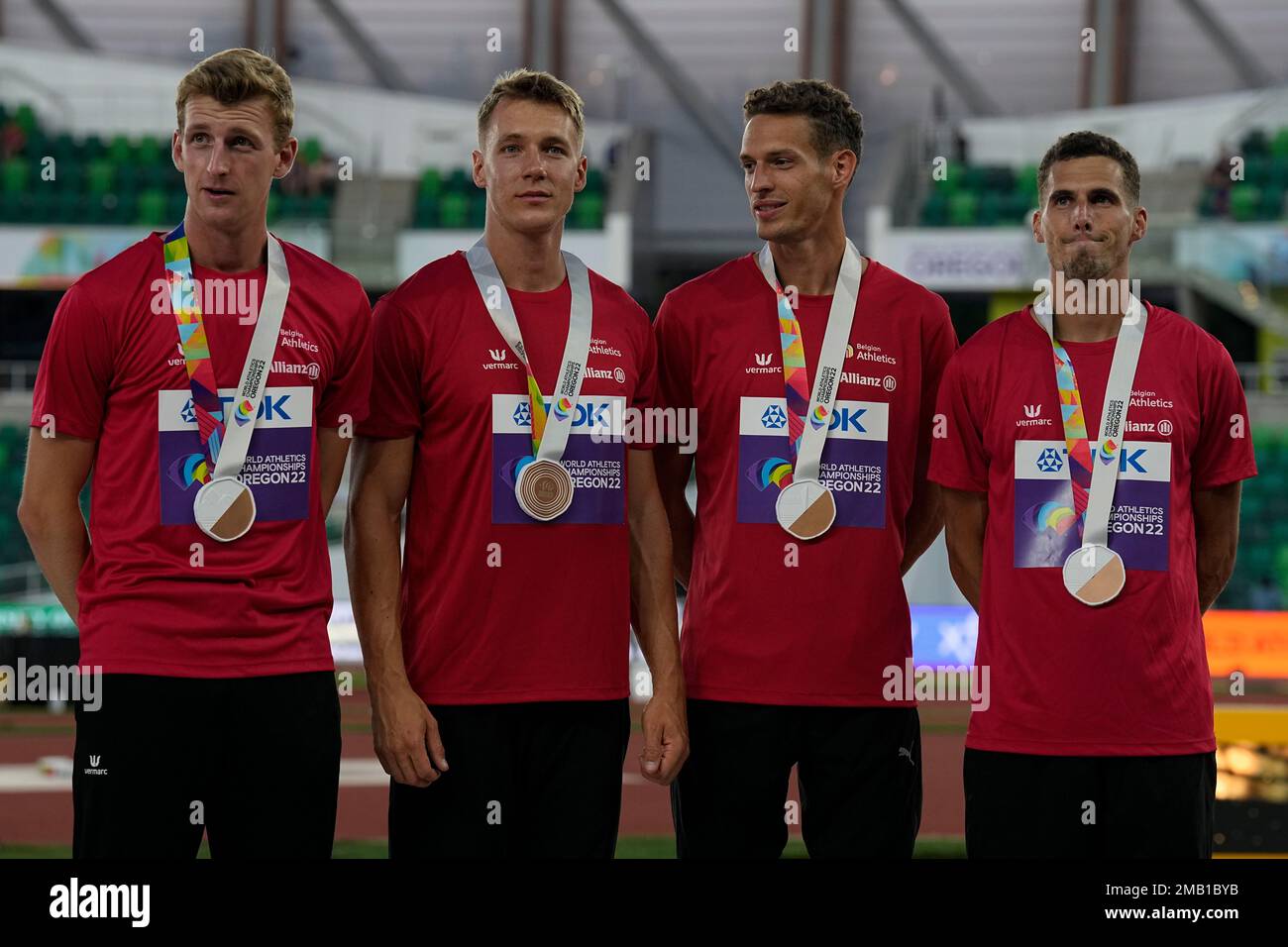 Bronze medalists team Britain pose during a medal ceremony for the men