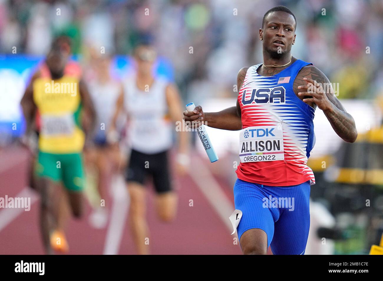 Champion Allison, of the United States, wins the men's 4x400meter