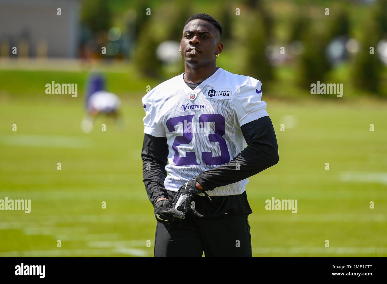 Minnesota Vikings cornerback Andrew Booth Jr. (23) warms up before