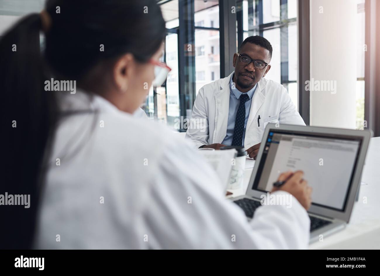 Your ideas are honestly great. two medical doctors having a meeting ...