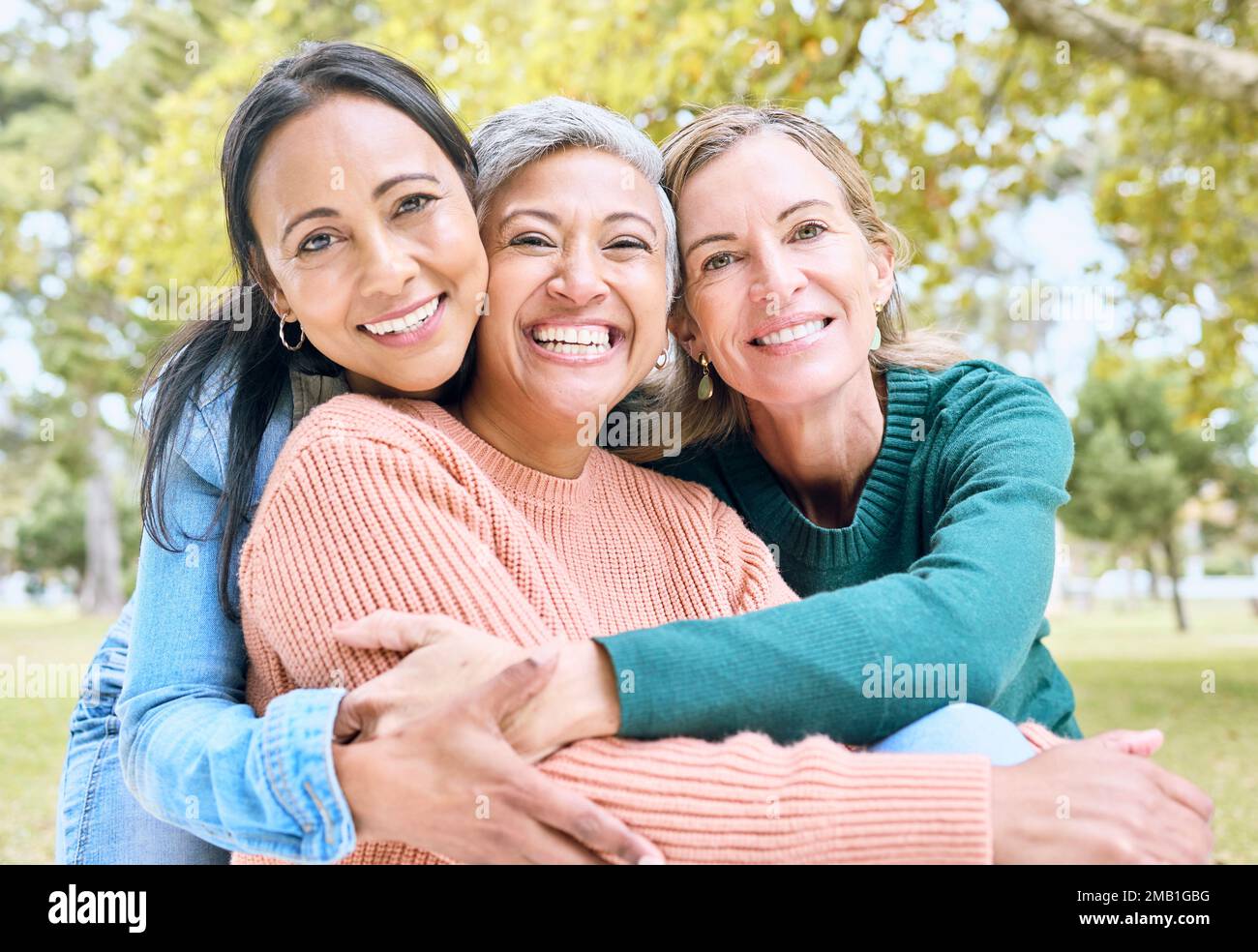 Retirement, women or bonding hug for portrait profile picture, social media or lifestyle freedom blog in relax environment. Smile, happy or elderly Stock Photo