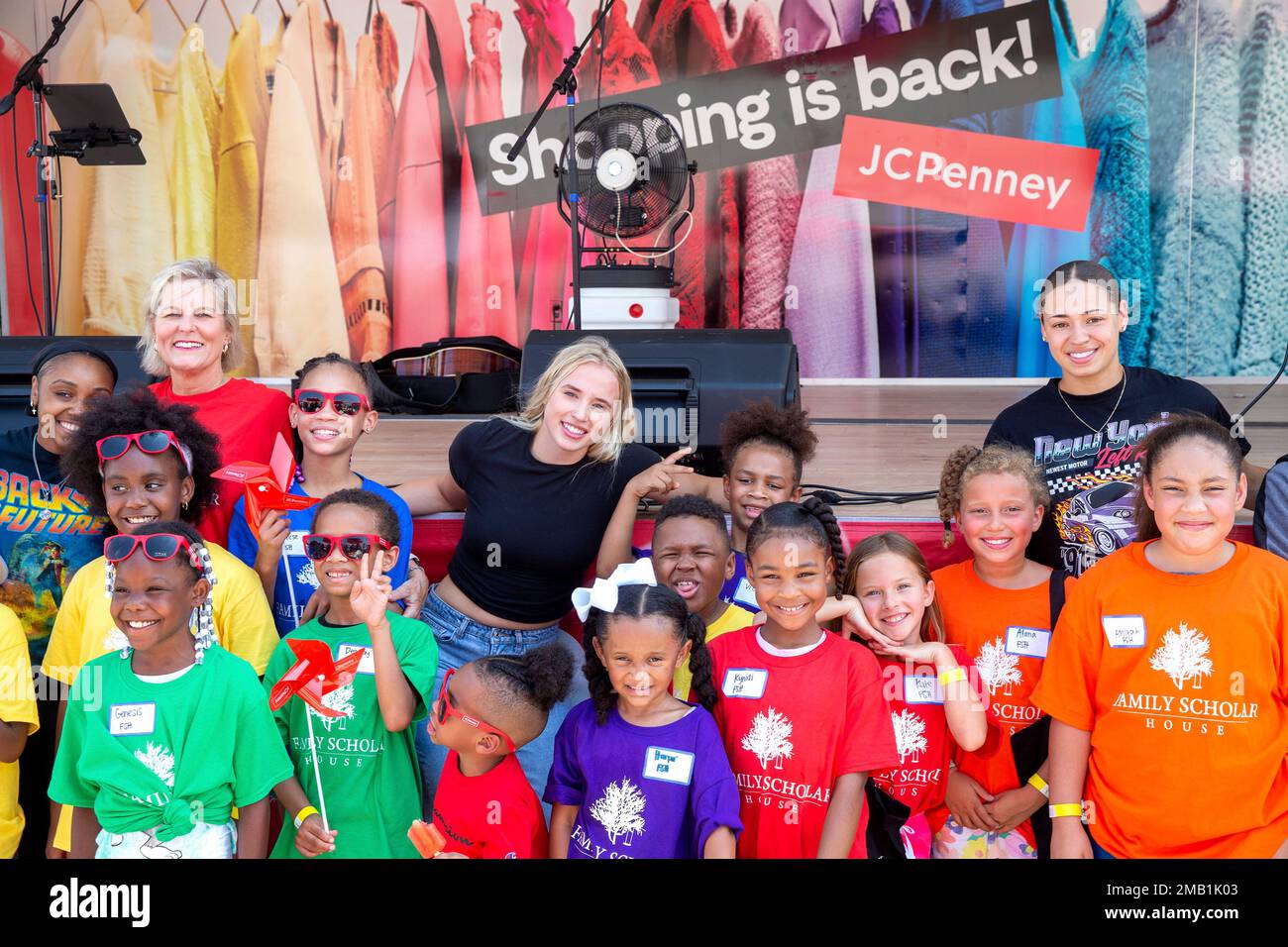 IMAGE DISTRIBUTED FOR JCPENNEY - University of Louisville Basketball team's  Hailey Van Lith, Mykasa Robinson and Chrislyn Carr along with Cathe Dykstra  and kids from Family Scholar House celebrate JCPenney's 120th birthday