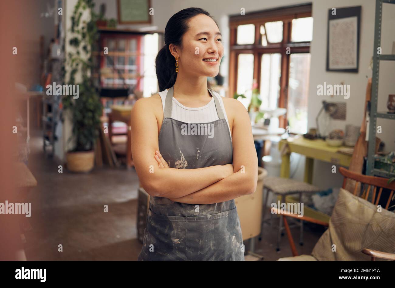 Asian woman, potter and arms crossed in pottery studio, small business ...