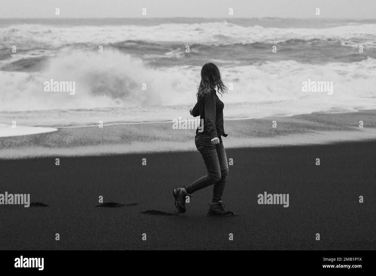 Woman and stormy sea Black and White Stock Photos & Images - Alamy