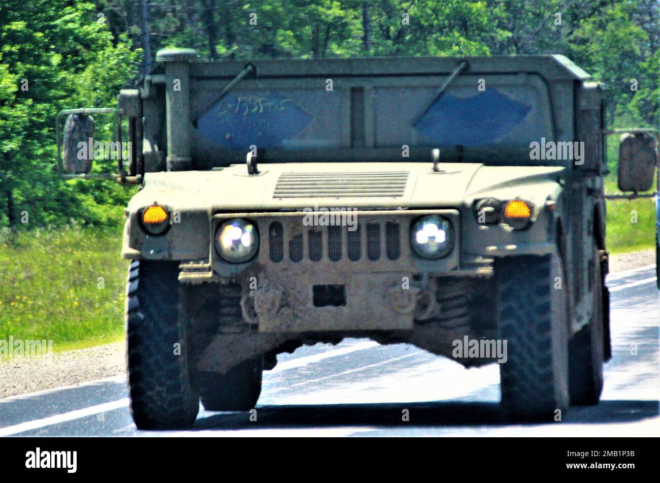 Service members at the installation for training drive a military vehicle on post June 9, 2022, at Fort McCoy, Wis. Annually, tens of thousands of troops complete institutional and transient troop training operations at Fort McCoy. During June 2022, thousands of troops also trained at Fort McCoy, including troops from the Wisconsin National Guard and Iowa National Guard. Stock Photo