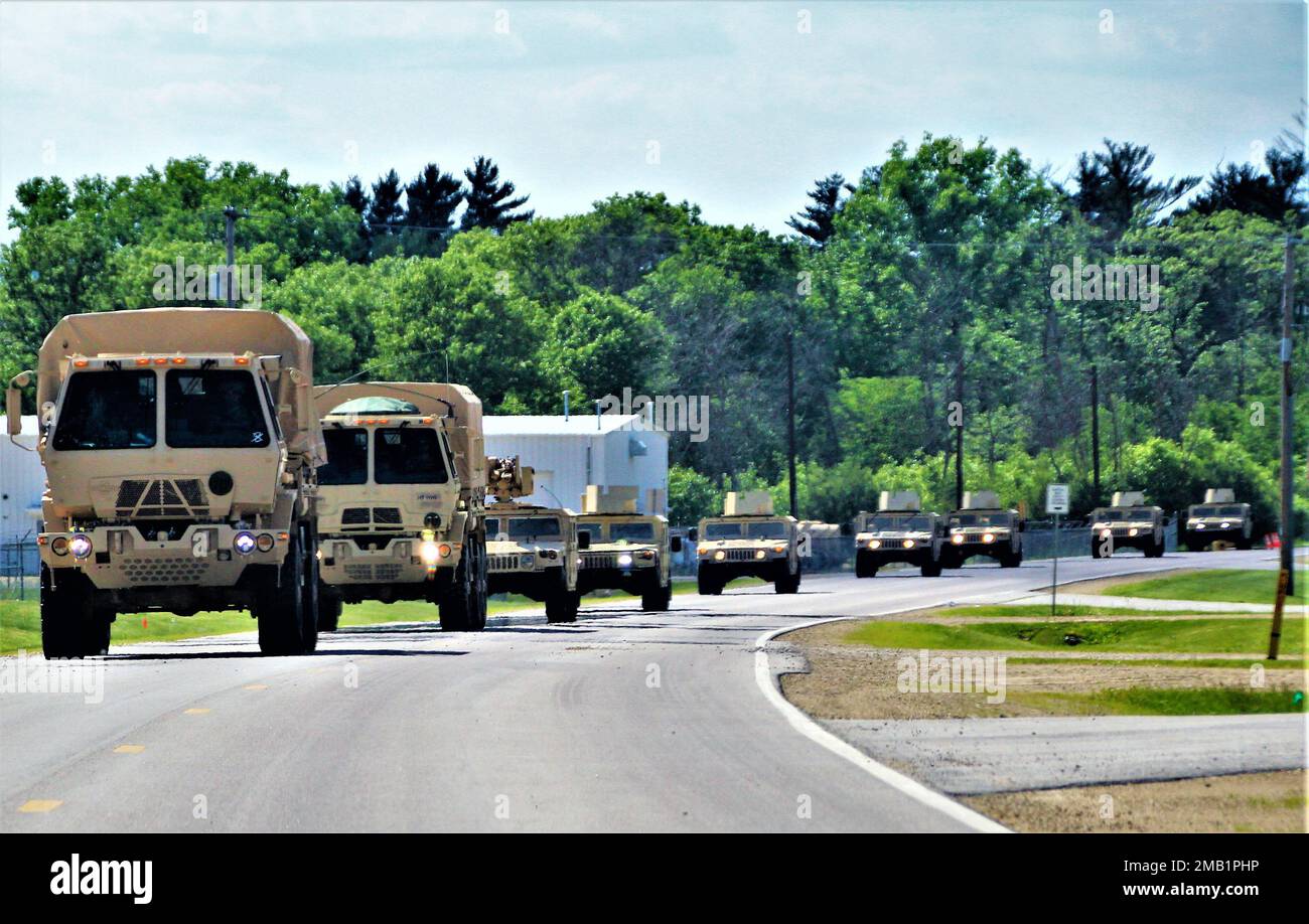 Service members at the installation for training drive vehicles in a convoy June 9, 2022, at Fort McCoy, Wis. Annually, tens of thousands of troops complete institutional and transient troop training operations at Fort McCoy. During June 2022, thousands of troops also trained at Fort McCoy, including troops from the Wisconsin National Guard and Iowa National Guard. Stock Photo