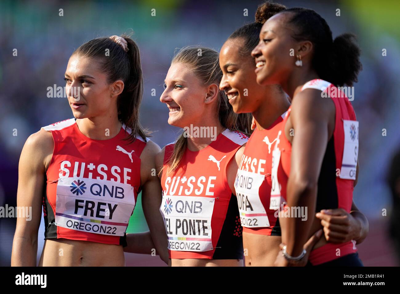 Team Switzerland poses after a heat during the women's 4x100meter