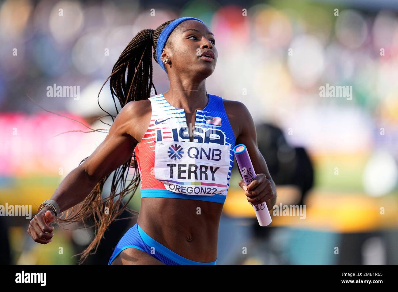 Twanisha Terry, of the United States, wins a heat during the women's