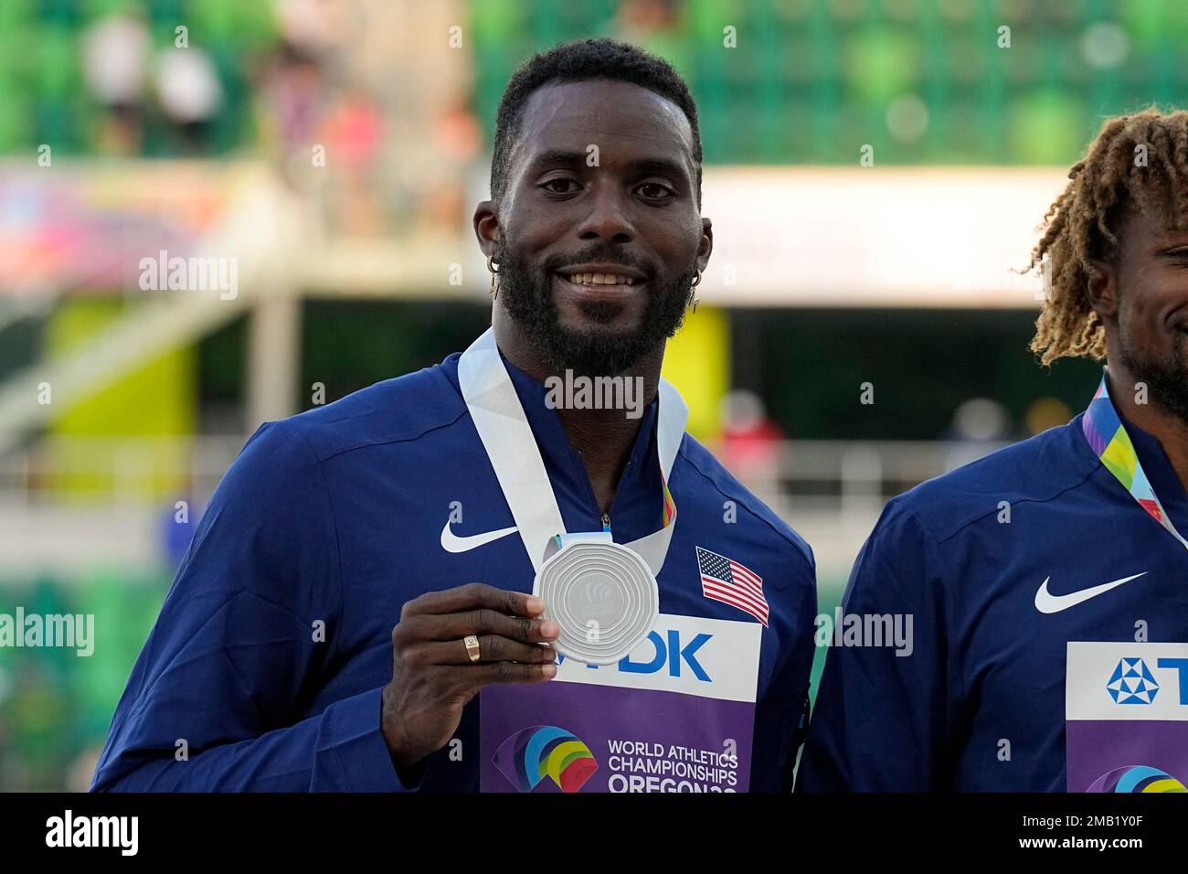 Silver medalist Bednarek, of the United States, stands during a medal ceremony for the