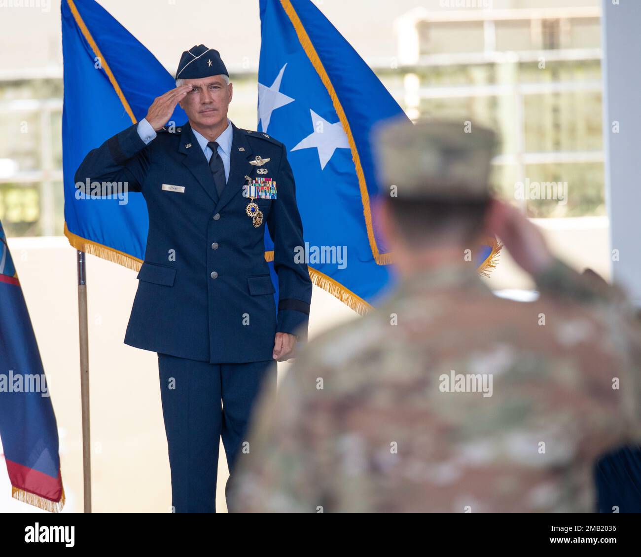 Brig. Gen. Jeremy T. Sloane, Commander of the 36th Wing, Andersen Air Force  Base, Guam, listens to a briefing during a Spring Commanders, Command  Chiefs and Spouses Conference at Joint Base Pearl