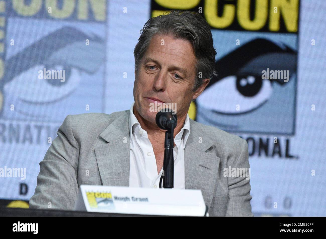Hugh Grant attends a panel for "Dungeons and Dragons Honor Among