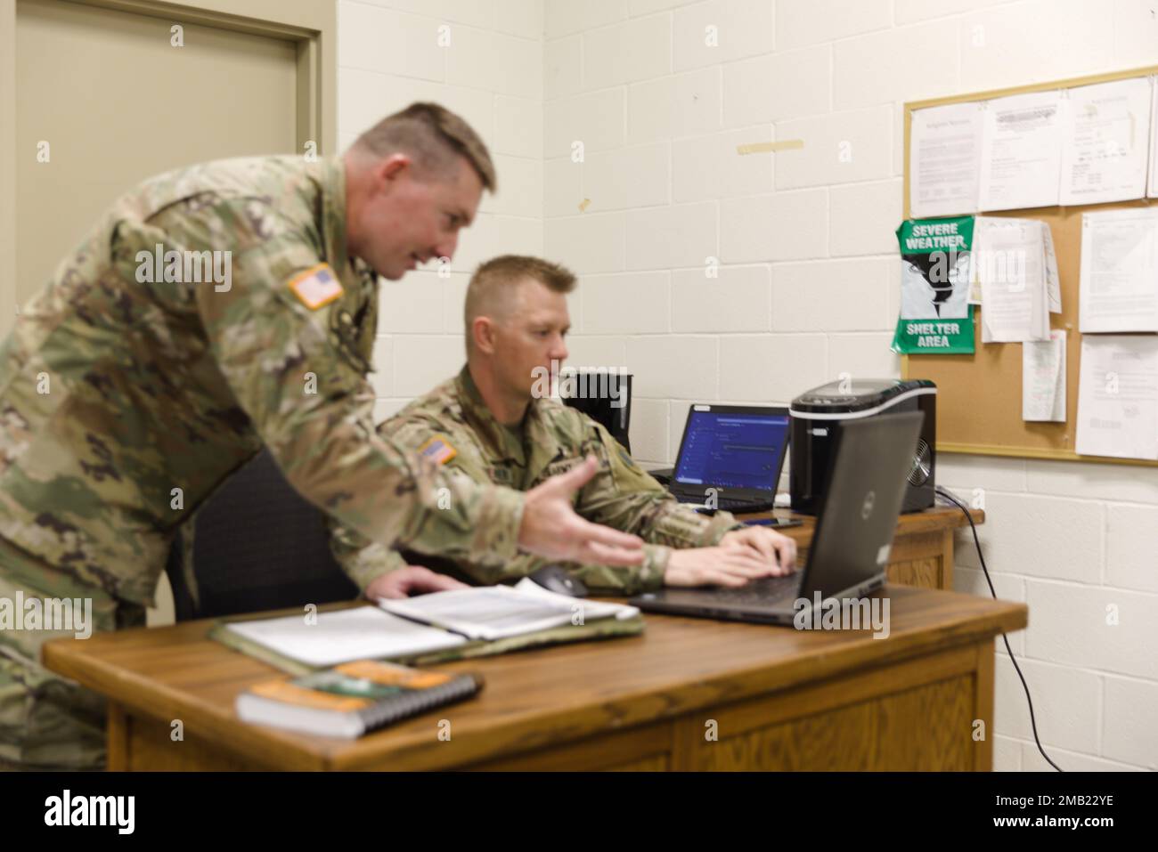 1st Lt. Christopher Muenter mentors Sgt. 1st Class Keith Ellsworth of