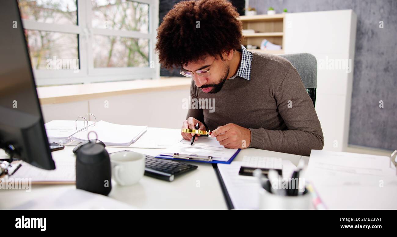 IRS Tax Audit. African Auditor Doing Debt Fraud Inspection Stock Photo ...
