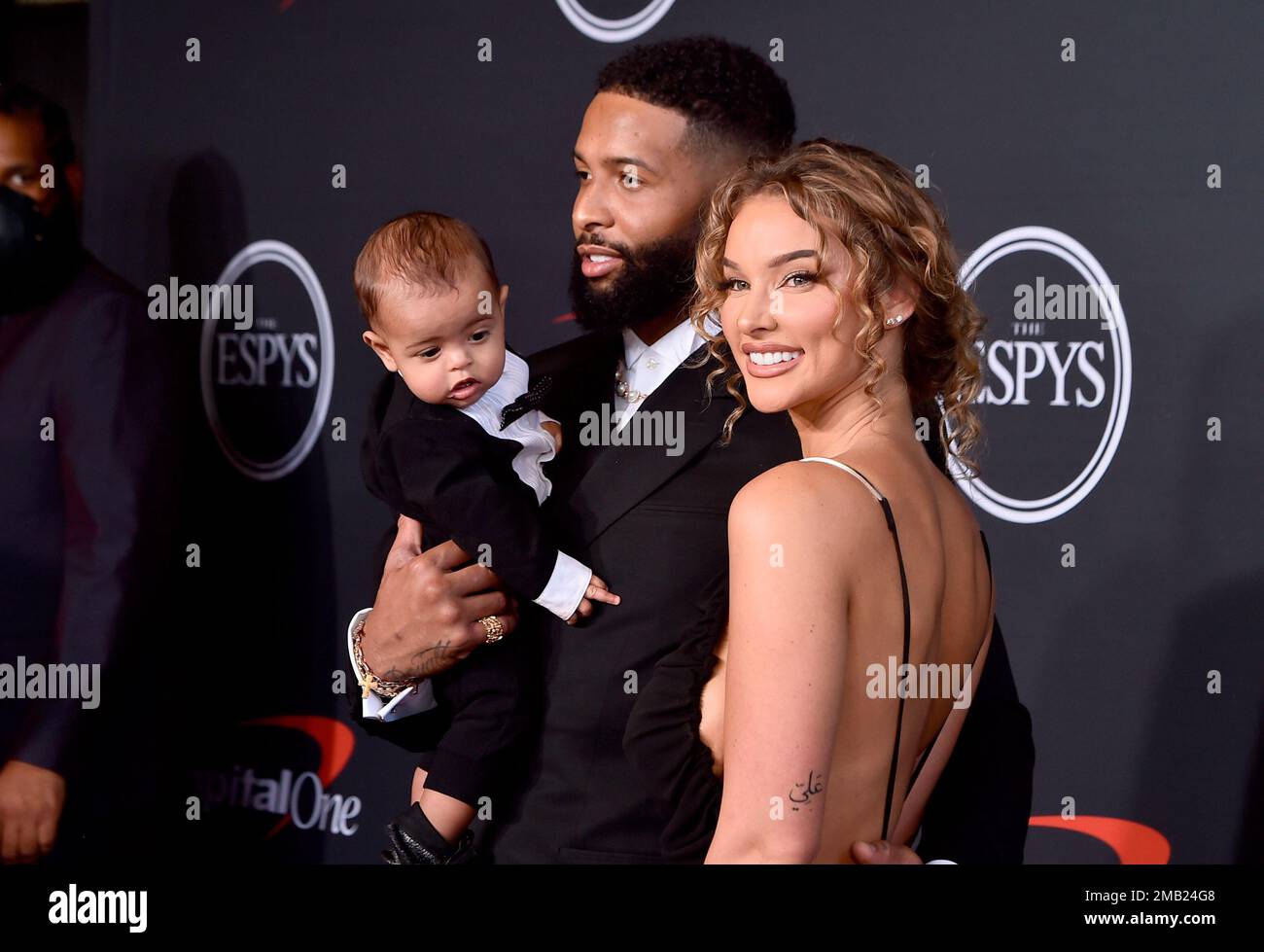Odell Beckham Jr., left, and Lauren Wood arrive with child Zydn Beckham