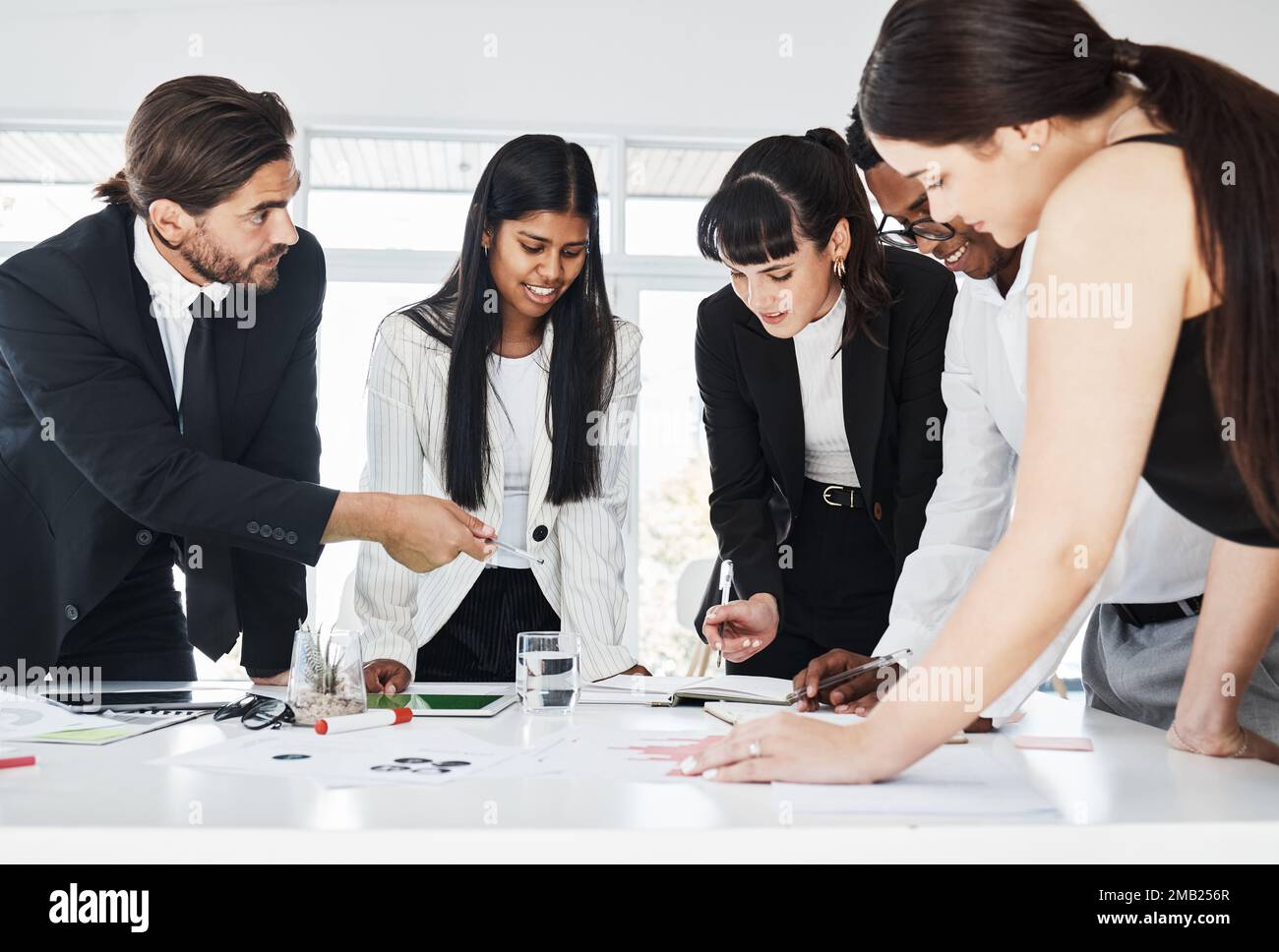 Teamwork, business meeting and discussion planning finance report, sales presentation or financial management in office. Group of people, team Stock Photo