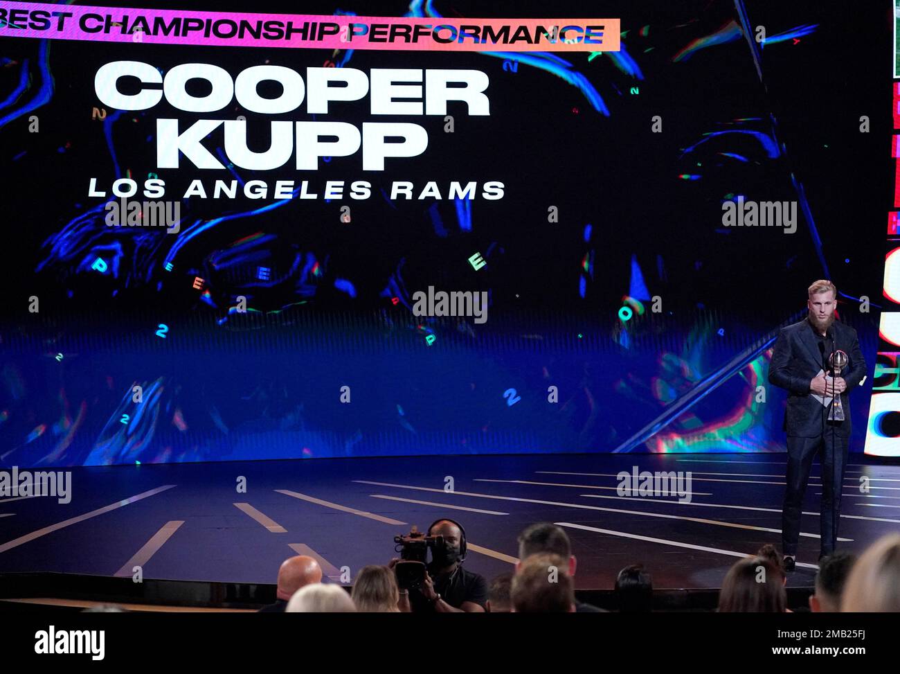 NFL player Cooper Kupp of the Los Angeles Rams accepts the award for